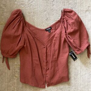 Burnt Orange corset top with puffy sleeves from Express